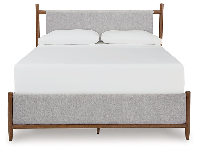 Lyncott Queen Upholstered Bed with Mirrored Dresser